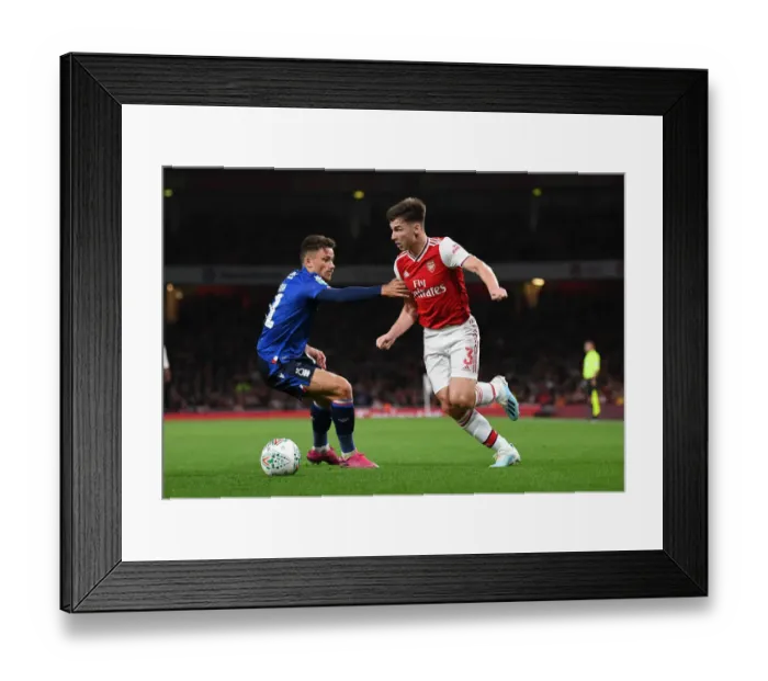 Framed Print : Tierney vs Cash: Battle of the Wings in Arsenal's Carabao Cup Clash against Nottingham Forest Framed Print : Tierney vs Cash: Battle of the Wings in Arsenal's Carabao Cup Clash against Nottingham Forest