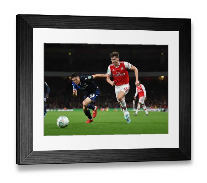Framed Print : Tierney vs. Lolley: Battle of the Wings in Arsenal's Carabao Cup Clash