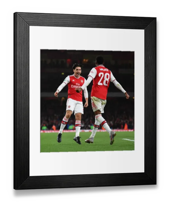 Framed Print : Arsenal's Joe Willock and Hector Bellerin Celebrate Goal: Carabao Cup Victory over Nottingham Forest