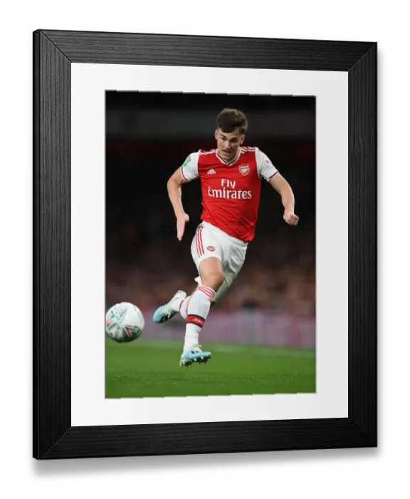 Framed Print : Arsenal's Kieran Tierney in Action Against Nottingham Forest in Carabao Cup Clash
