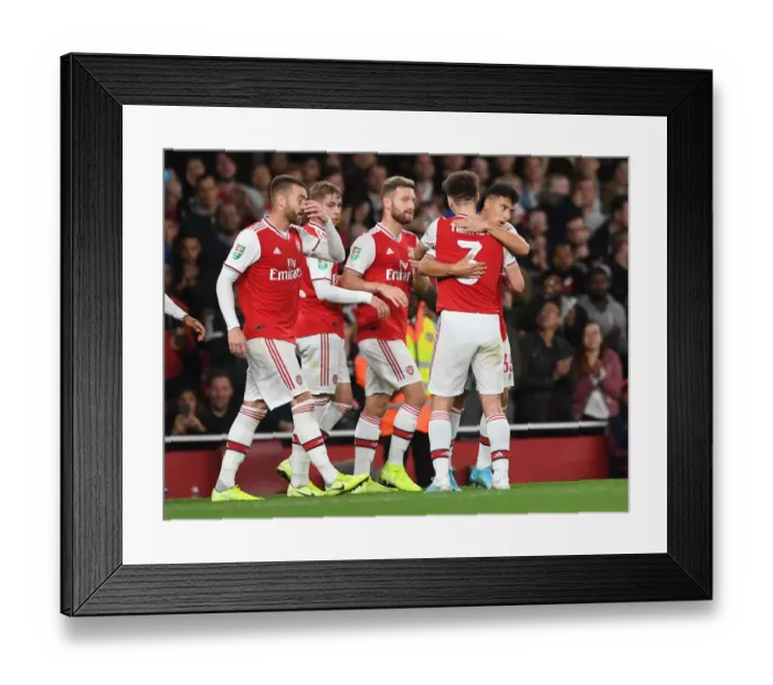 Framed Print : Arsenal's Martinelli and Tierney Celebrate First Goal vs. Nottingham Forest in Carabao Cup Framed Print : Arsenal's Martinelli and Tierney Celebrate First Goal vs. Nottingham Forest in Carabao Cup