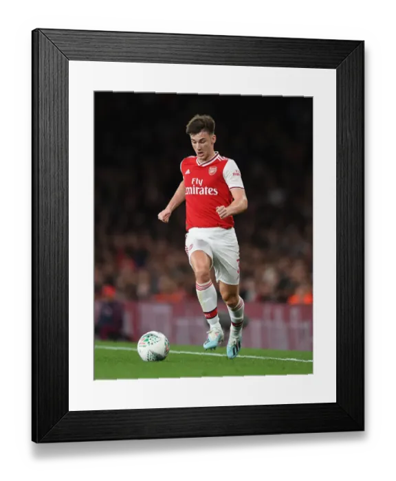 Framed Print : Arsenal's Kieran Tierney in Action Against Nottingham Forest in Carabao Cup Third Round