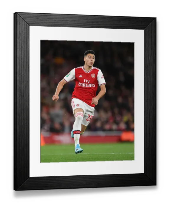 Framed Print : Arsenal's Martinelli Shines in Carabao Cup Clash Against Nottingham Forest