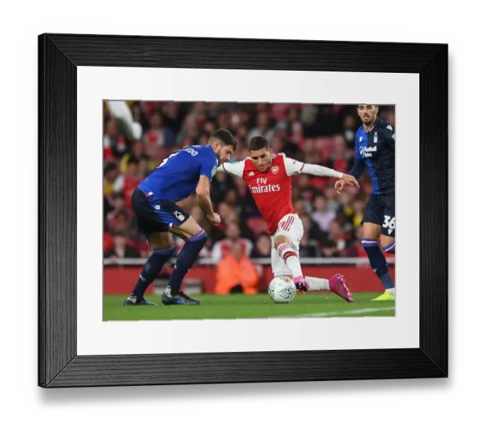 Framed Print : Arsenal's Torreira Clashes with Forest's Figueiredo in Carabao Cup Showdown Framed Print : Arsenal's Torreira Clashes with Forest's Figueiredo in Carabao Cup Showdown