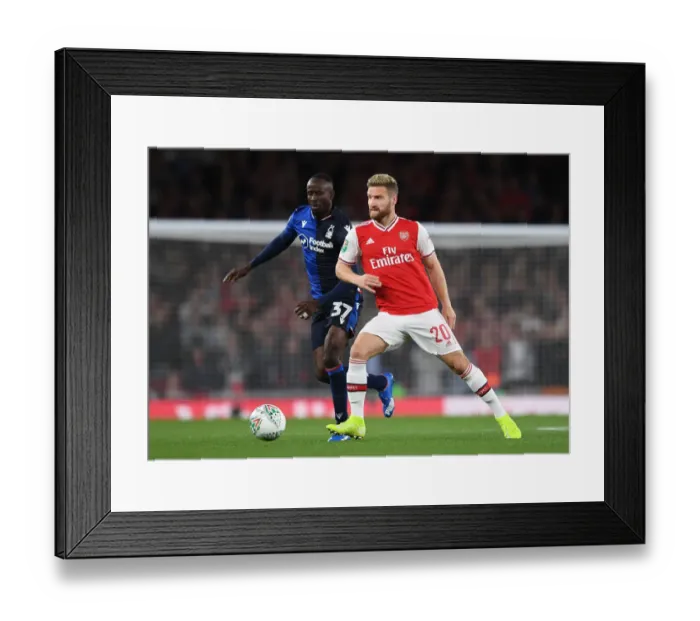 Framed Print : Arsenal vs. Nottingham Forest: Tense Moment in Carabao Cup Clash