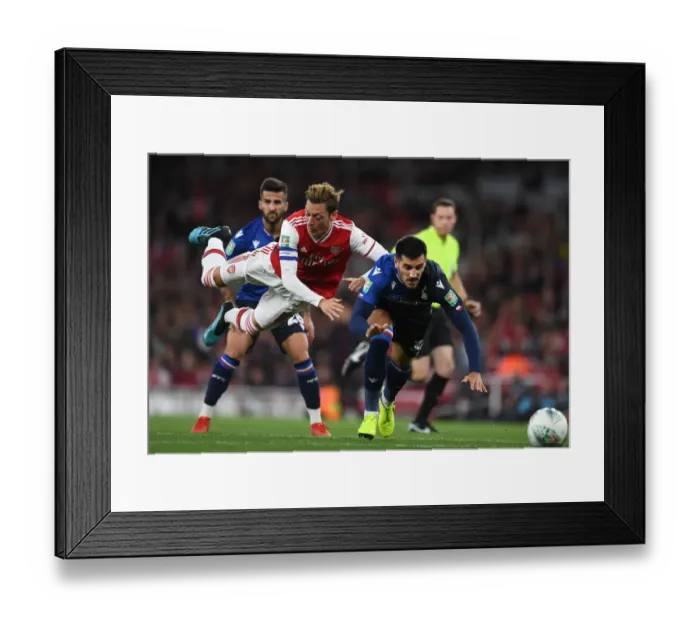 Framed Print : Arsenal vs. Nottingham Forest: Carabao Cup Showdown - Ozil vs. Rodriguez