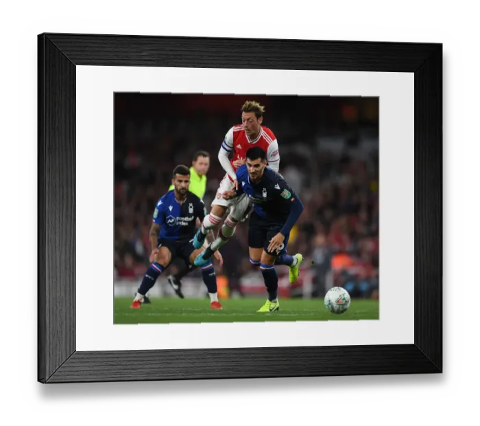 Framed Print : Arsenal vs. Nottingham Forest: Mesut Ozil Faces Off in Carabao Cup Clash
