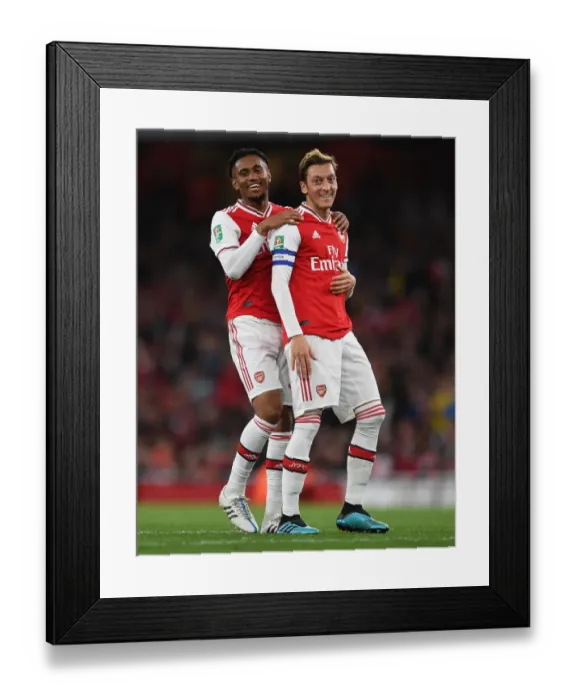 Framed Print : Arsenal's Ozil and Nelson in Action against Nottingham Forest in Carabao Cup Third Round Framed Print : Arsenal's Ozil and Nelson in Action against Nottingham Forest in Carabao Cup Third Round