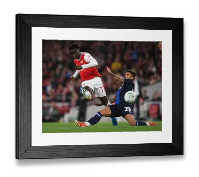 Framed Print : Arsenal's Bukayo Saka Scores Under Pressure Against Nottingham Forest in Carabao Cup Third Round Framed Print : Arsenal's Bukayo Saka Scores Under Pressure Against Nottingham Forest in Carabao Cup Third Round