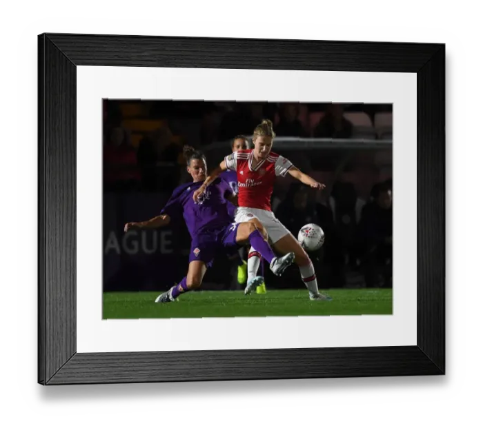 Framed Print : Arsenal Women vs Fiorentina Women: A Fight in the UEFA Women's Champions League - Miedema vs Agard