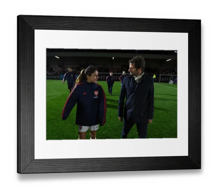 Framed Print : Arsenal Women vs Fiorentina Women: Montemurro and van de Donk in Deep Discussion during UEFA Champions League Match