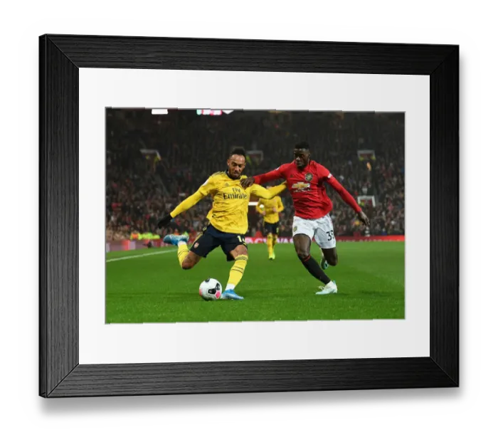 Framed Print : Manchester United vs. Arsenal: Aubameyang Faces Off Against Tuanzebe in Premier League Clash Framed Print : Manchester United vs. Arsenal: Aubameyang Faces Off Against Tuanzebe in Premier League Clash
