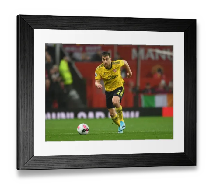 Framed Print : Sokratis's Determined Stare: Arsenal vs Manchester United Clash (2019-20)