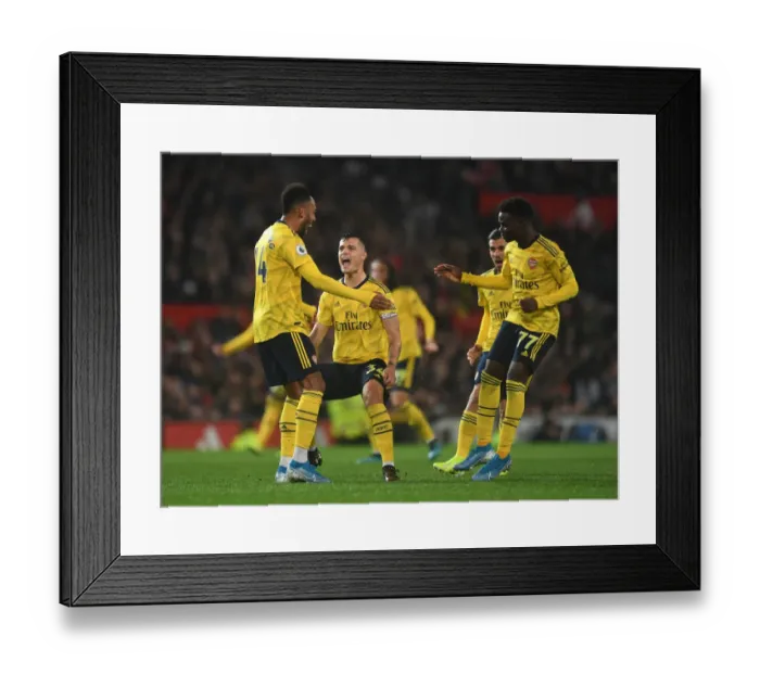 Framed Print : Aubameyang's Strike: Arsenal's Dramatic Victory Over Manchester United in the 2019-20 Premier League