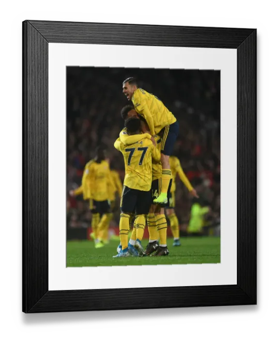Framed Print : Aubameyang's Strike: Arsenal's Triumph over Manchester United in the 2019-20 Premier League
