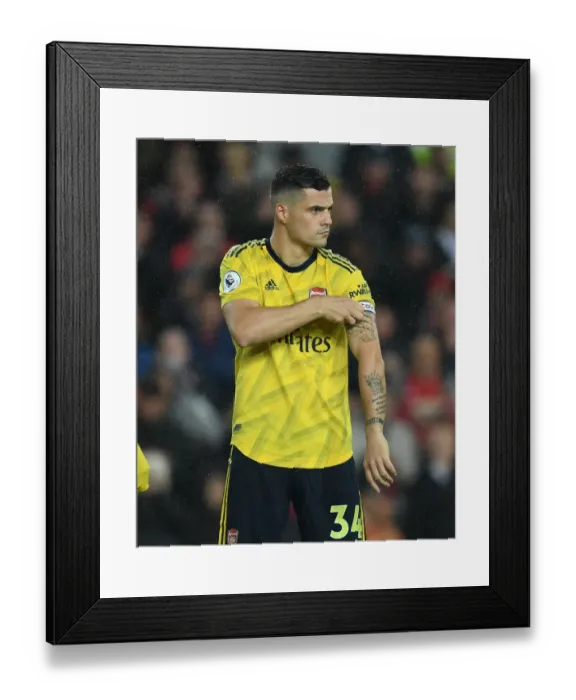 Framed Print : Granit Xhaka in Action: Manchester United vs. Arsenal, Premier League 2019-20