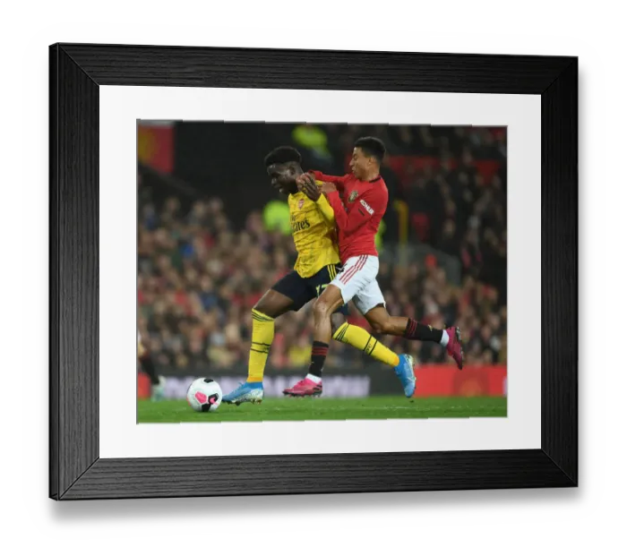 Framed Print : Manchester United vs Arsenal: Clash of the Titans - Bukayo Saka vs Ashley Young Framed Print : Manchester United vs Arsenal: Clash of the Titans - Bukayo Saka vs Ashley Young