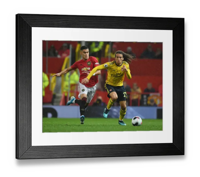 Framed Print : Clash of the Midfield Titans: Guendouzi vs. Pereira - Battle at Old Trafford (Premier League 2019-20) Framed Print : Clash of the Midfield Titans: Guendouzi vs. Pereira - Battle at Old Trafford (Premier League 2019-20)