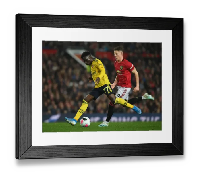 Framed Print : Manchester United vs Arsenal: Bukayo Saka vs Scott McTominay Clash in Premier League Showdown Framed Print : Manchester United vs Arsenal: Bukayo Saka vs Scott McTominay Clash in Premier League Showdown