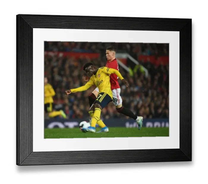 Framed Print : Saka vs. McTominay: A Premier League Showdown at Old Trafford - Arsenal vs. Manchester United Framed Print : Saka vs. McTominay: A Premier League Showdown at Old Trafford - Arsenal vs. Manchester United