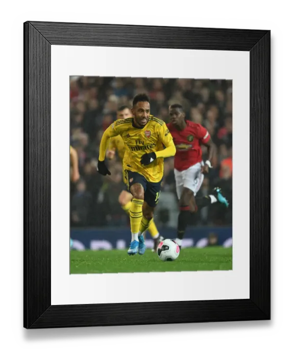 Framed Print : Aubameyang Faces Off Against Manchester United in Premier League Clash Framed Print : Aubameyang Faces Off Against Manchester United in Premier League Clash