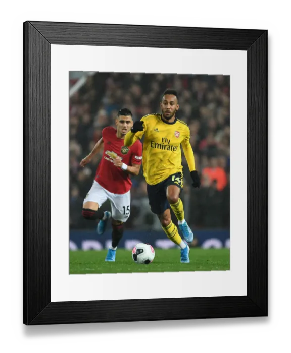 Framed Print : Aubameyang vs Manchester United: Premier League Showdown - Clash of Titans
