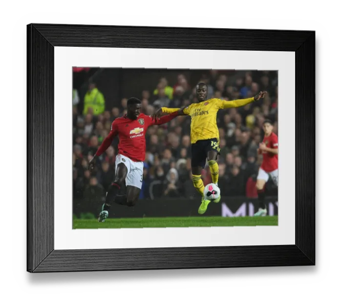 Framed Print : Pepe vs Tuanzebe: Manchester United vs Arsenal FC - Premier League Showdown (2019-20) Framed Print : Pepe vs Tuanzebe: Manchester United vs Arsenal FC - Premier League Showdown (2019-20)
