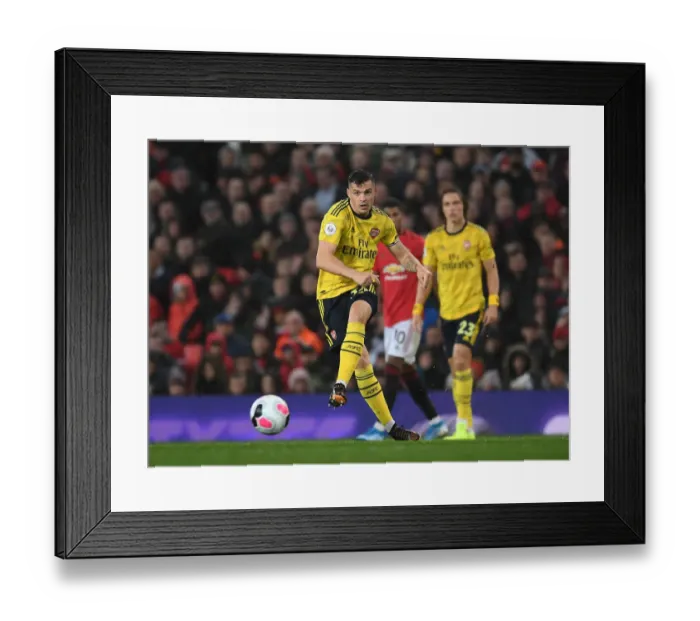 Framed Print : Granit Xhaka in Action: Arsenal vs Manchester United, Premier League 2019-20 Framed Print : Granit Xhaka in Action: Arsenal vs Manchester United, Premier League 2019-20