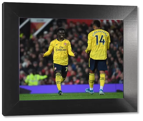 Arsenal's Unforgettable Goal Celebration: Aubameyang and Saka's Strike Secures Victory Over Manchester United, 2019-20 Premier League