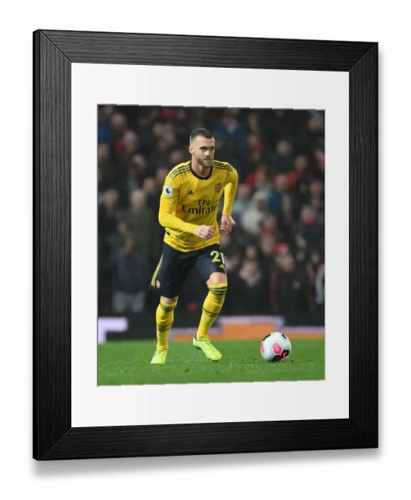 Framed Print : Arsenal's Calum Chambers Faces Off Against Manchester United at Old Trafford (Premier League 2019-20)