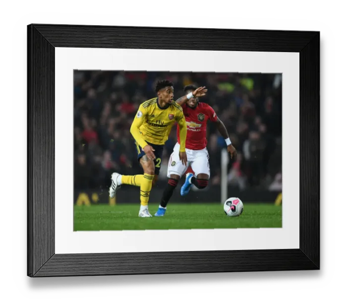 Framed Print : Reiss Nelson Outsmarts Fred: A Crucial Turning Point in the Manchester United vs. Arsenal Battle, Premier League 2019-20