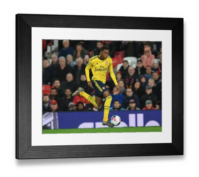 Framed Print : Clash of the Titans: Joe Willock's Premier League Showdown - Manchester United vs Arsenal