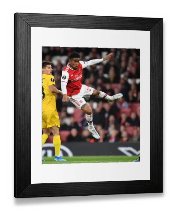Framed Print : Arsenal vs Standard Liege: Europa League Showdown at Emirates Stadium Framed Print : Arsenal vs Standard Liege: Europa League Showdown at Emirates Stadium