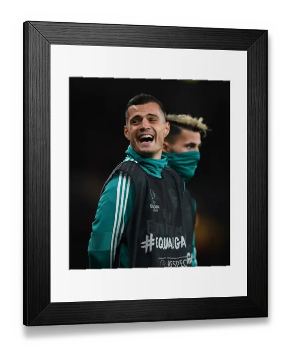 Framed Print : Arsenal's Xhaka Substitution: A Moment from the Arsenal vs Standard Liege UEFA Europa League Match, 2019-20