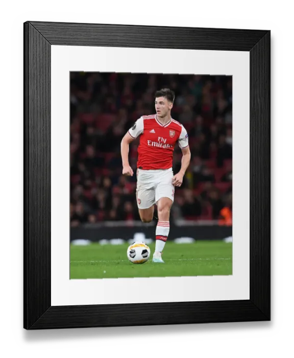 Framed Print : Arsenal's Kieran Tierney in Action Against Standard Liege in Europa League