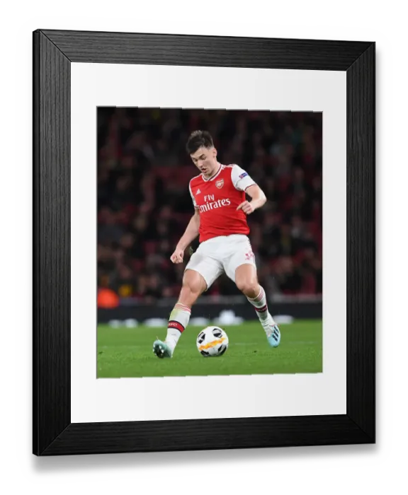 Framed Print : Arsenal's Kieran Tierney in Action against Standard Liege in Europa League (2019-20) Framed Print : Arsenal's Kieran Tierney in Action against Standard Liege in Europa League (2019-20)