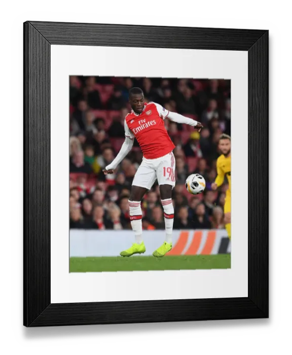 Framed Print : Arsenal's Nicolas Pepe Shines: Overpowering Standard Liege in Europa League