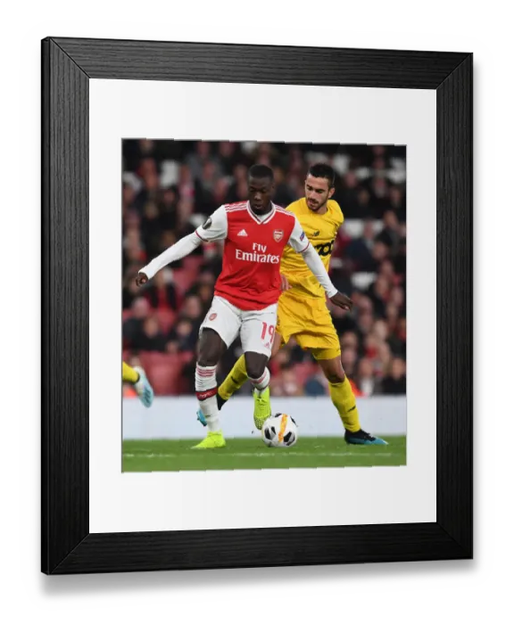 Framed Print : Arsenal vs Standard Liege: UEFA Europa League Clash at Emirates Stadium