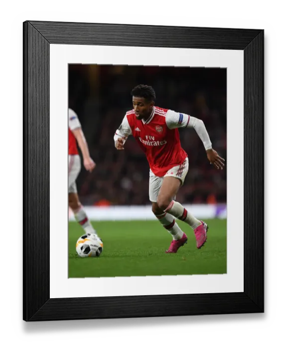 Framed Print : Arsenal's Nelson Stars: Europa League Victory Over Standard Liege Framed Print : Arsenal's Nelson Stars: Europa League Victory Over Standard Liege
