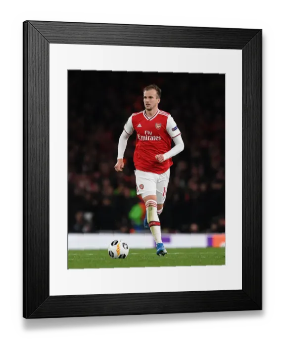 Framed Print : Arsenal's Rob Holding in Action against Standard Liege in Europa League Group Stage Framed Print : Arsenal's Rob Holding in Action against Standard Liege in Europa League Group Stage