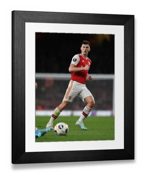 Framed Print : Arsenal's Kieran Tierney in Action during Europa League Match against Standard Liege Framed Print : Arsenal's Kieran Tierney in Action during Europa League Match against Standard Liege