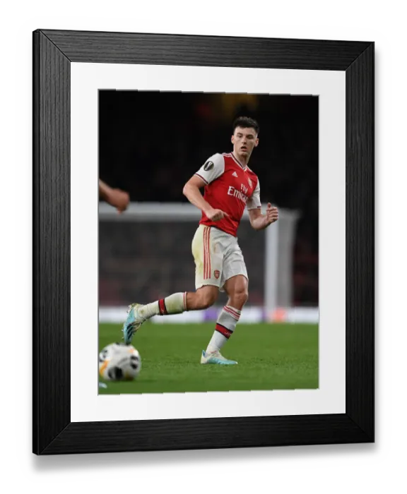 Framed Print : Arsenal's Kieran Tierney in Action during Europa League Match against Standard Liege Framed Print : Arsenal's Kieran Tierney in Action during Europa League Match against Standard Liege