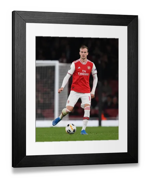 Framed Print : Arsenal vs Standard Liege: Europa League Showdown at Emirates Stadium