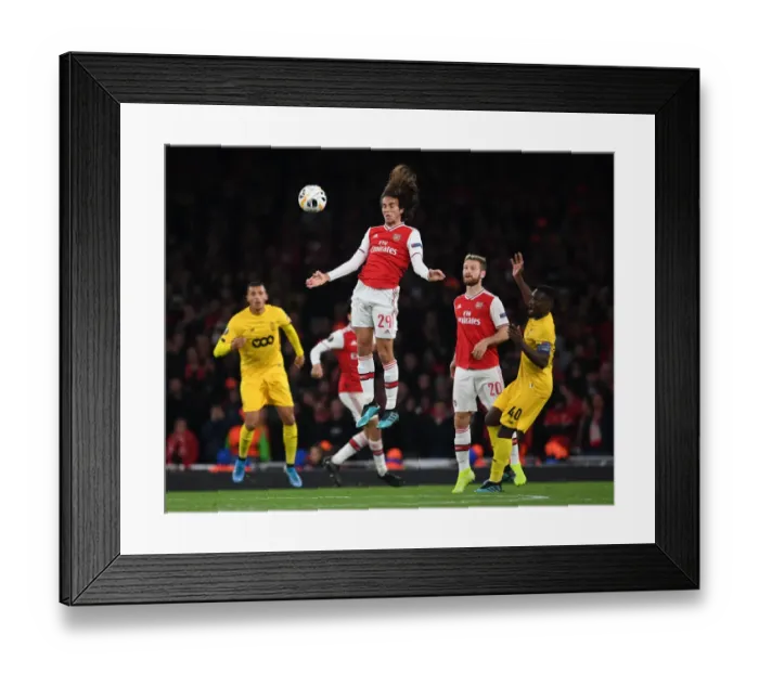 Framed Print : Arsenal's Matteo Guendouzi in Action against Standard Liege in Europa League Match
