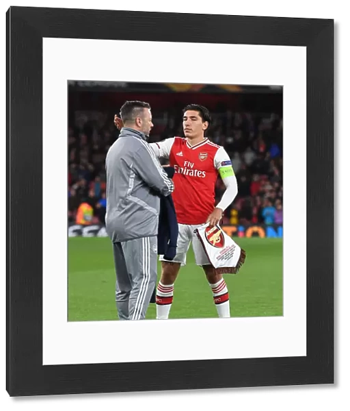 Arsenal's Heartwarming Reunion: Hector Bellerin and Kit Manager Paul Akers Embrace at Arsenal vs Standard Liege (UEFA Europa League 2019-20)