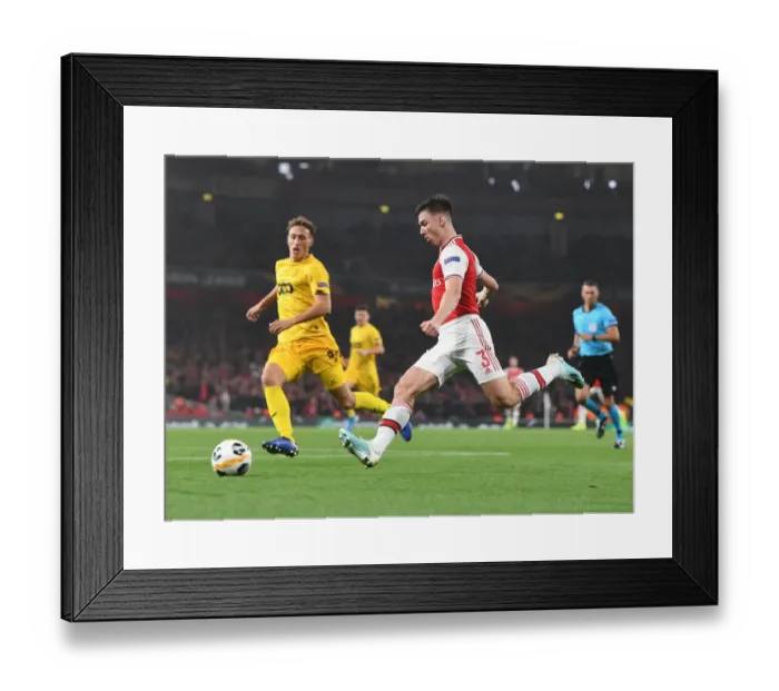 Framed Print : Arsenal's Kieran Tierney in Action during Europa League Match against Standard Liege