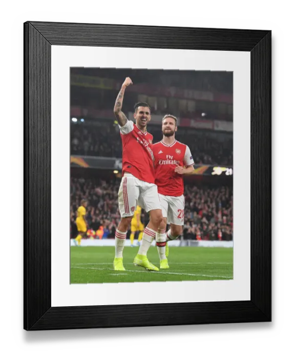 Framed Print : Arsenal's Europa League Triumph: Dani Ceballos and Shkodran Mustafi's Goal Celebration