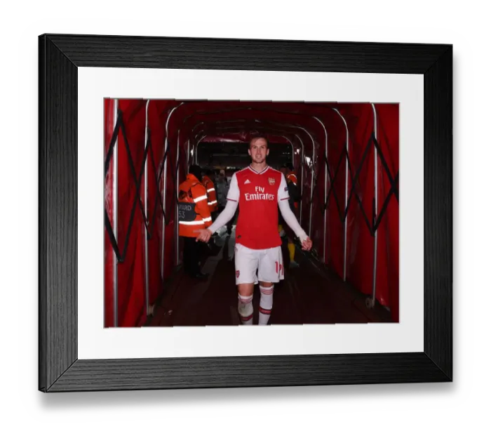 Framed Print : Arsenal's Rob Holding Celebrates after UEFA Europa League Victory over Standard Liege Framed Print : Arsenal's Rob Holding Celebrates after UEFA Europa League Victory over Standard Liege