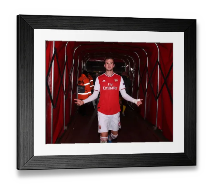 Framed Print : Arsenal's Rob Holding Celebrates after Europa League Victory over Standard Liege Framed Print : Arsenal's Rob Holding Celebrates after Europa League Victory over Standard Liege