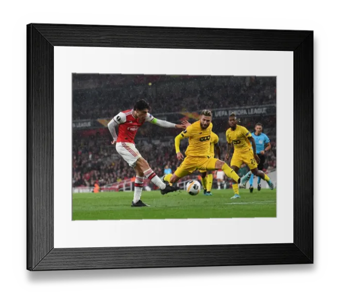 Framed Print : Arsenal's Bellerin Scores Under Pressure Against Standard Liege in Europa League